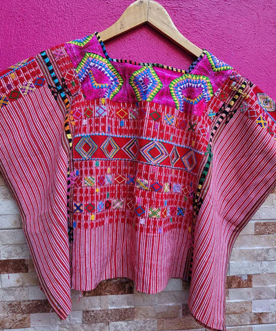 Red Colotenango huipil with elaborate neckline