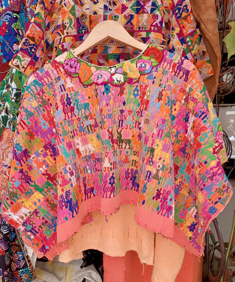 Colorful on salmon Coban huipil