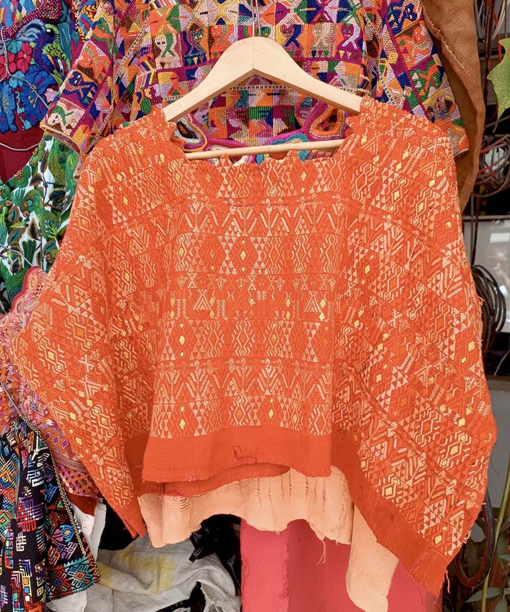 Bright orange Coban huipil