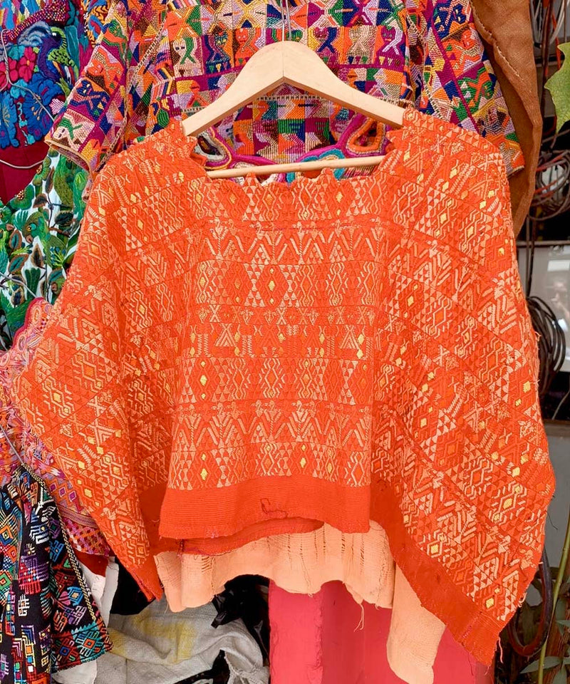 Bright orange Coban huipil