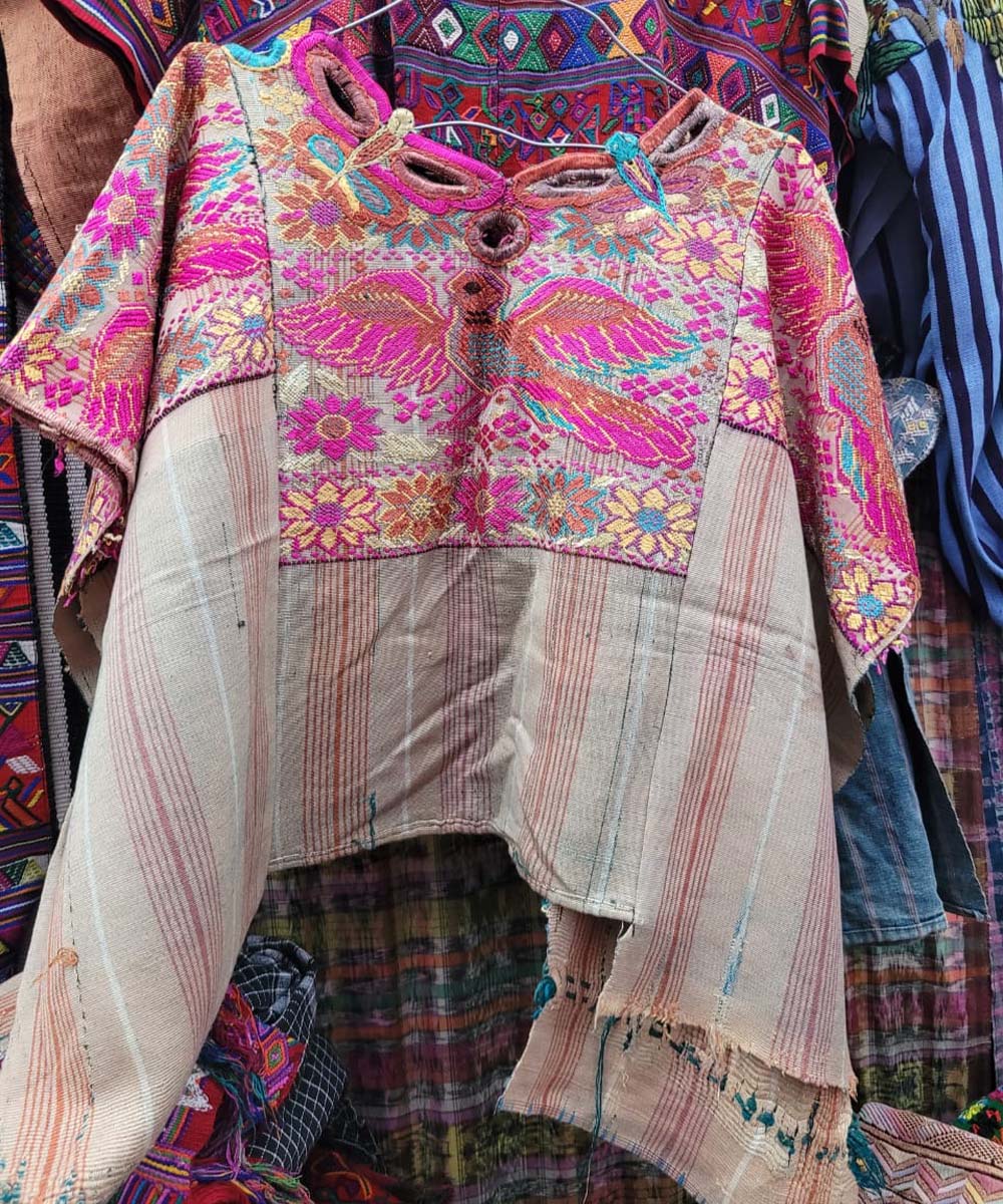 Chichi huipil with pink birds and flowers