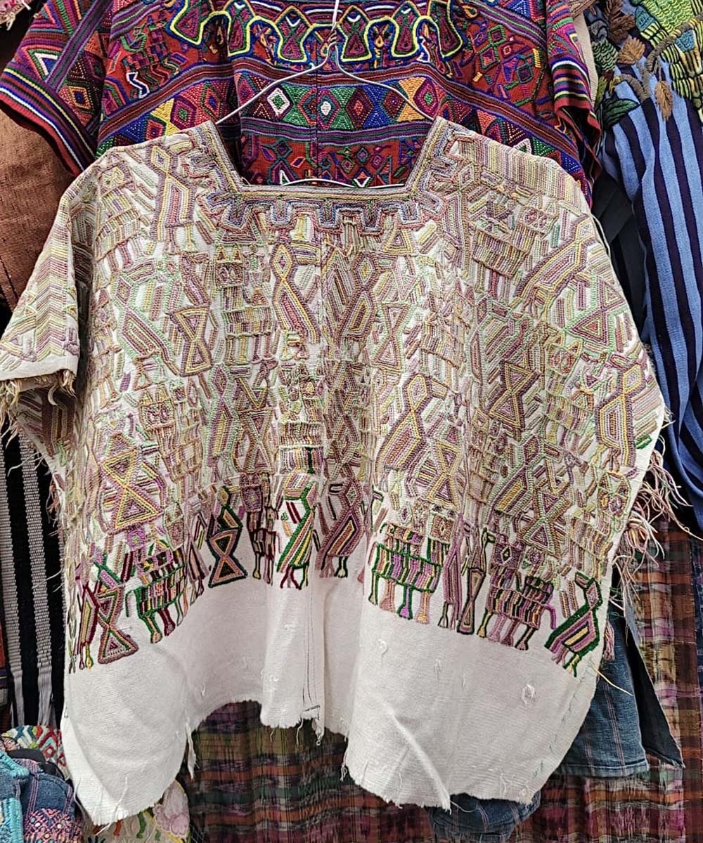 Beige and white Nebaj huipil