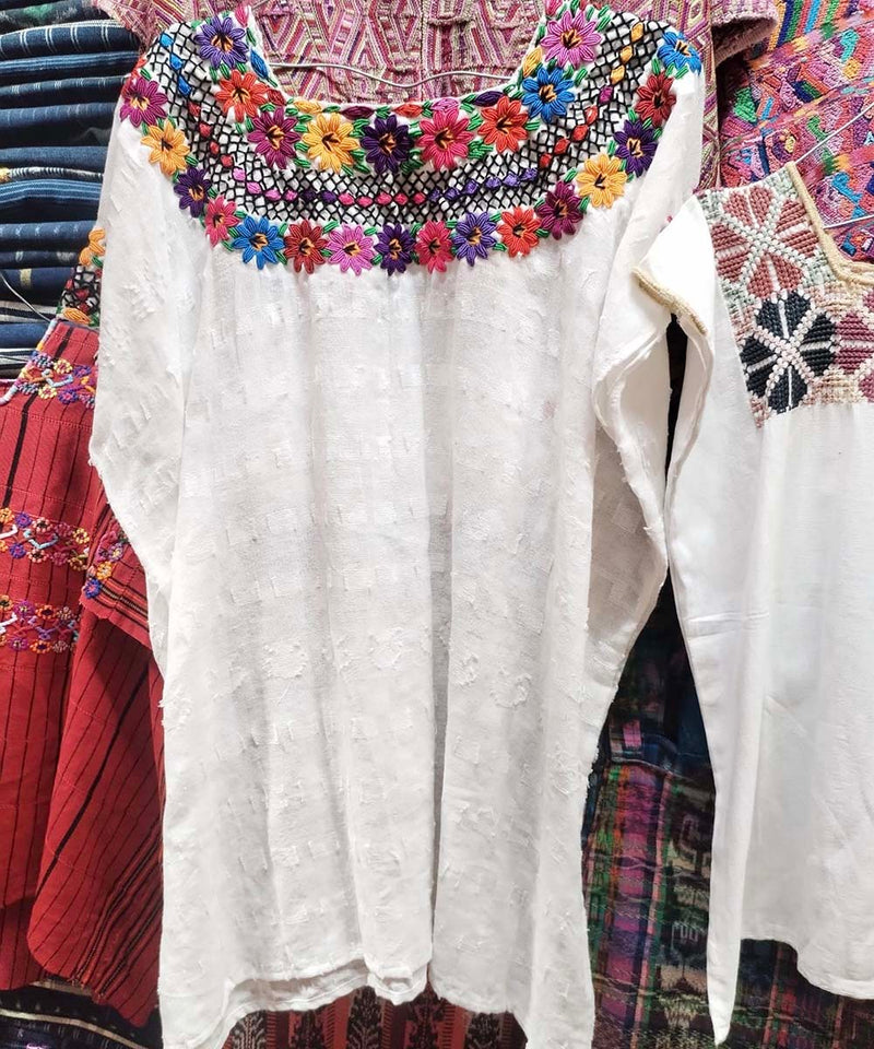 White Coban huipil with colorful neckline