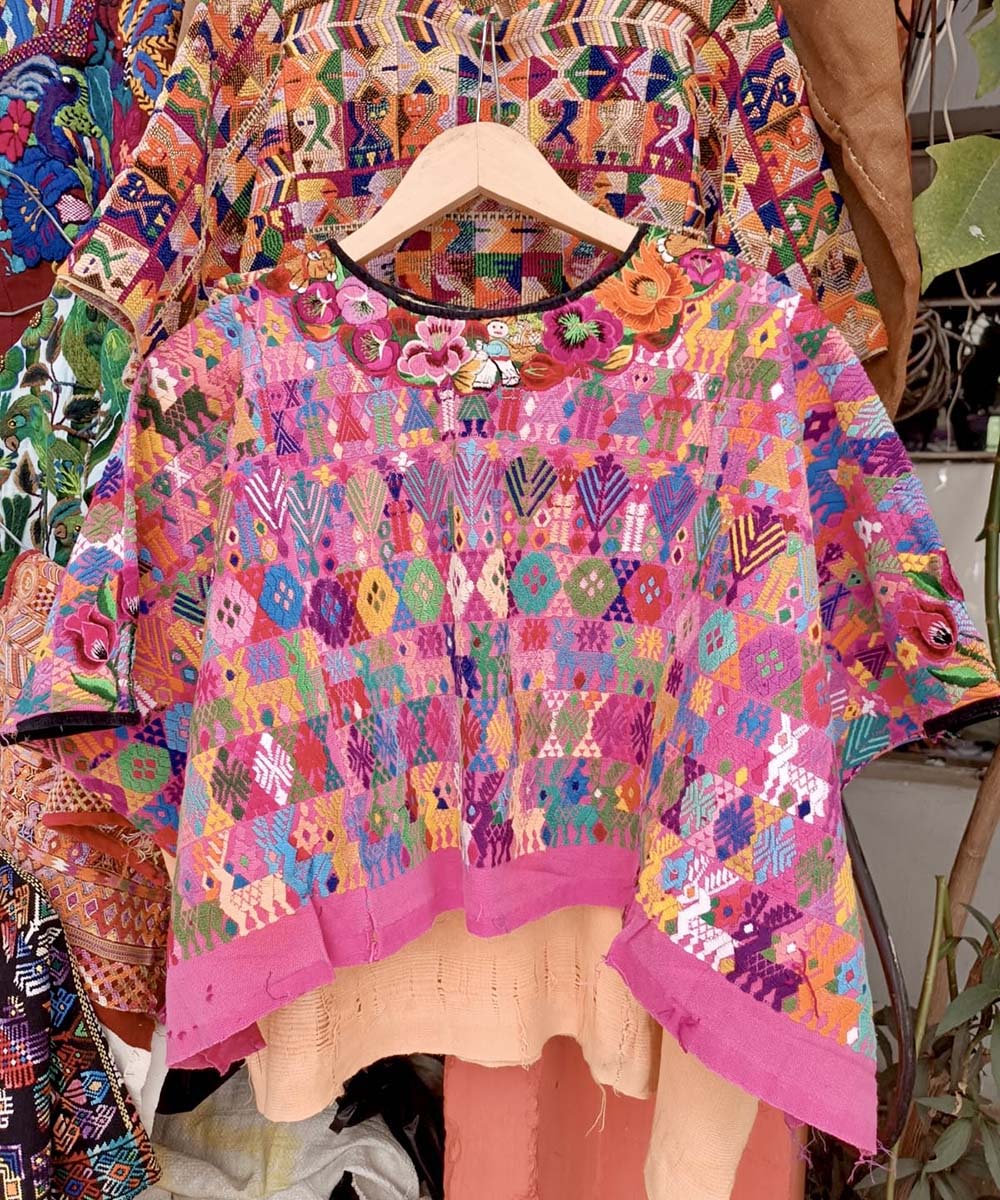 Colorful on pink Coban huipil