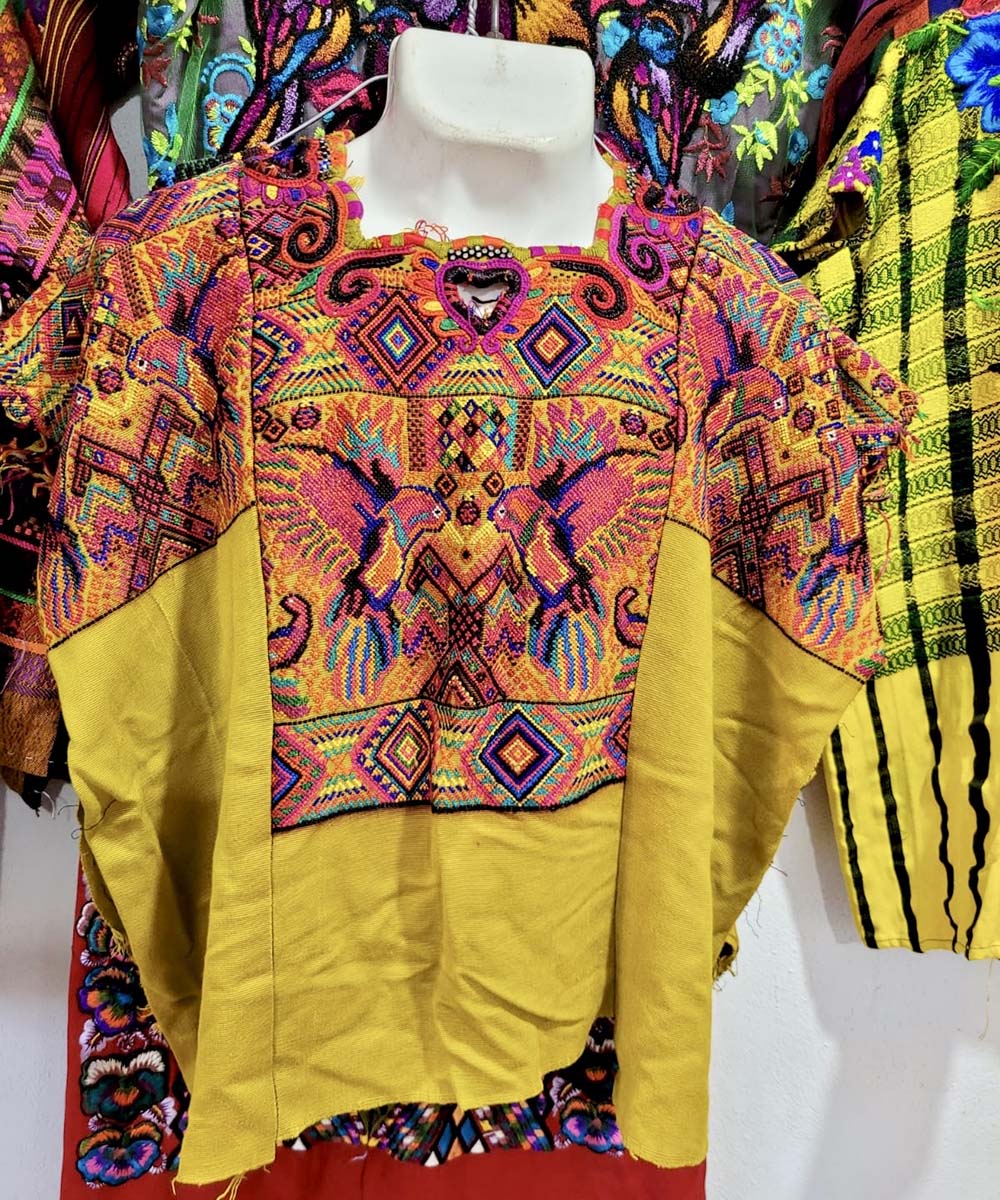 Yellow and pink Chichi huipil with birds