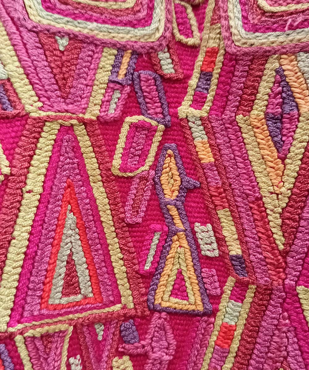 Bright red and yellow Nebaj huipil