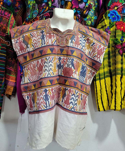 Pink blue and yellow Nebaj huipil