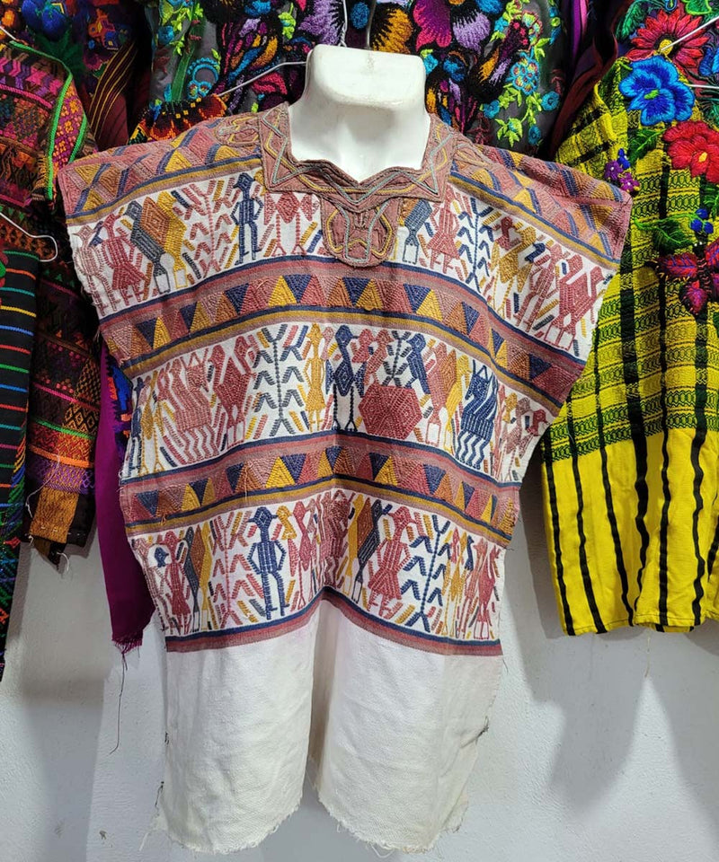 Pink blue and yellow Nebaj huipil