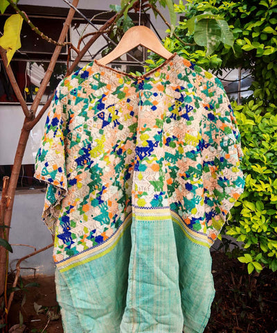 Green and peach Coban huipil