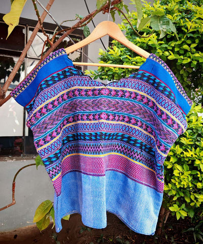 Blue and pink Comalapa huipil