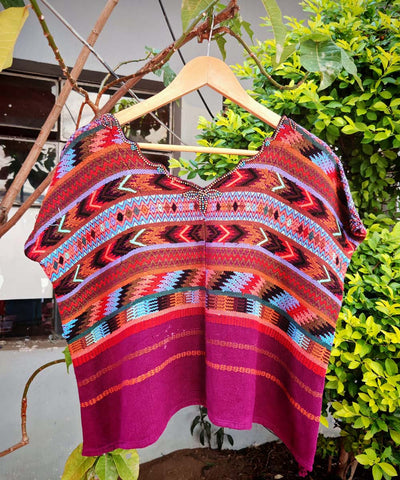 Fuchsia and orange Comalapa huipil