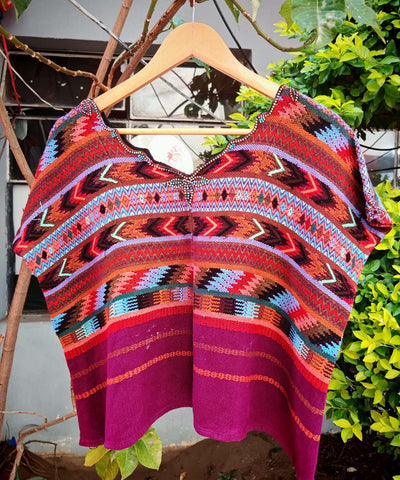 Fuchsia and orange Comalapa huipil