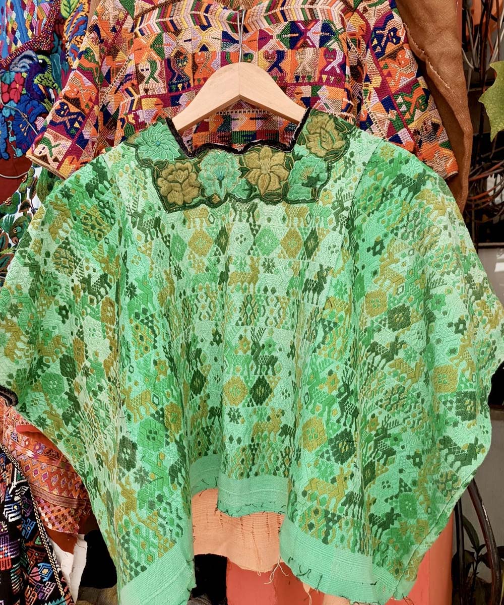 Green and gold Coban huipil