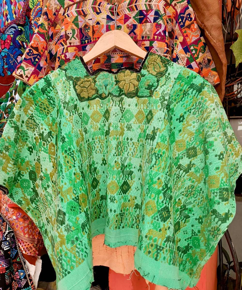 Green and gold Coban huipil