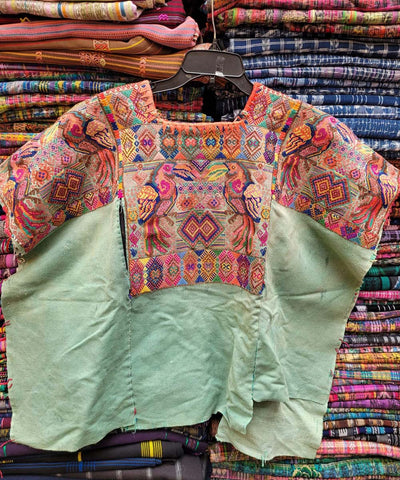 Green Chichi huipil with colorful toucans