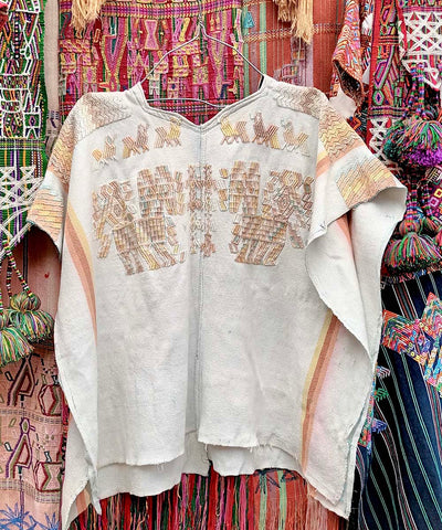 White Chajul huipil with stylised horses