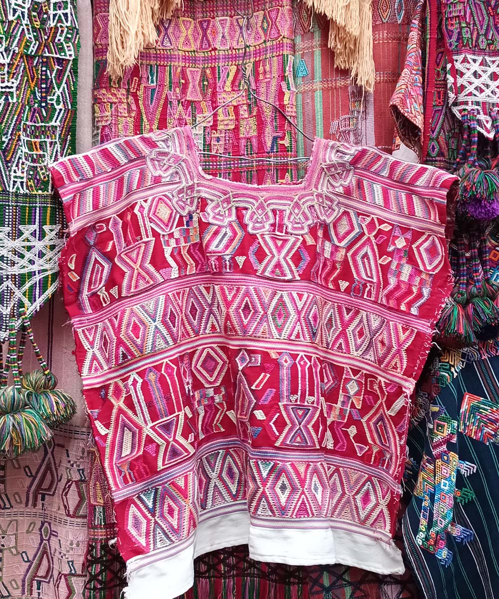 Pink and red Nebaj huipil