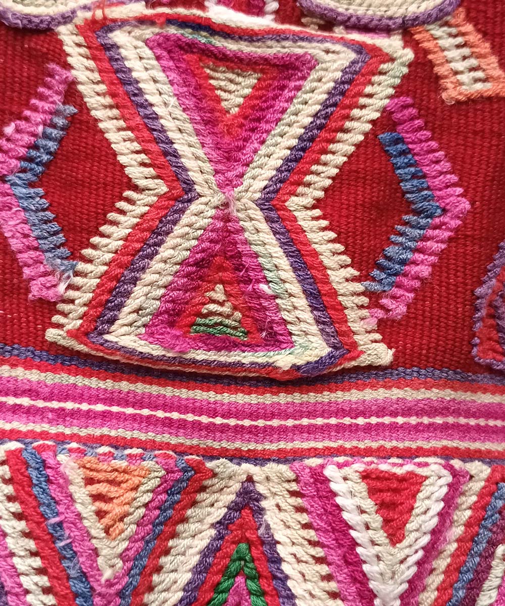 Pink and red Nebaj huipil