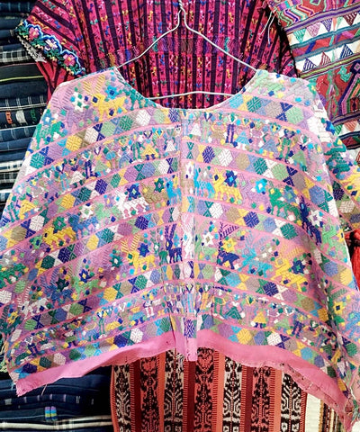 Pink and blue Coban huipil