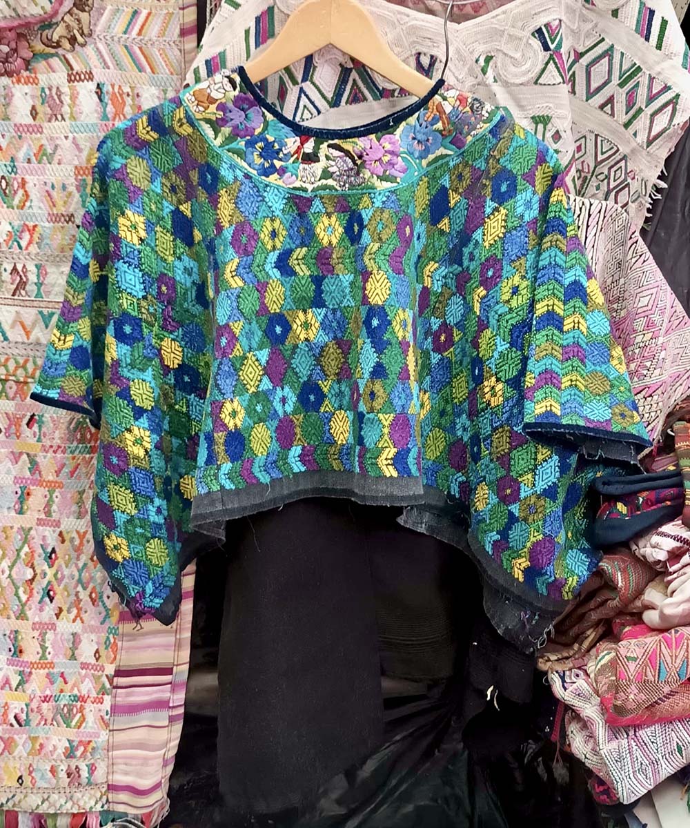 Jewel coloured Coban huipil
