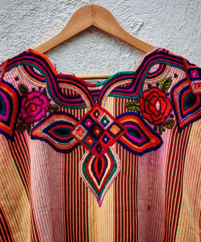 Pink and primrose huipil with bold neckline