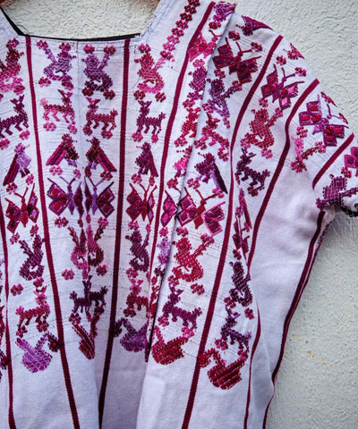 Berry and white San Lucas Toliman huipil