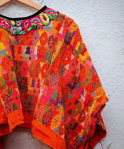 Orange Coban huipil with floral neckline