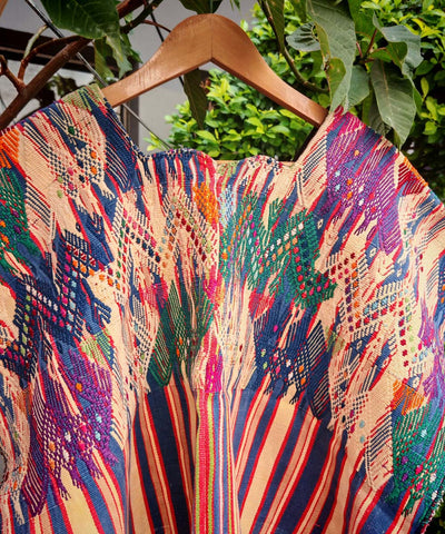 Purple and yellow Sacatapequez huipil