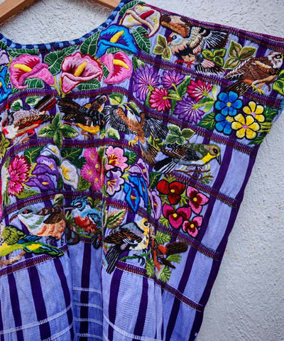 Lilac Santiago huipil with an embroidered garden