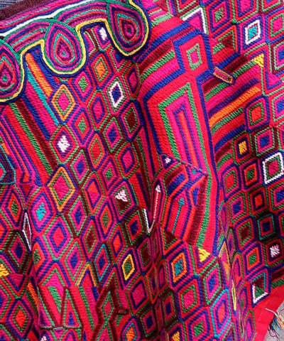 Red and purple Nebaj huipil