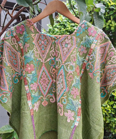 Pale green and pink Chichi huipil