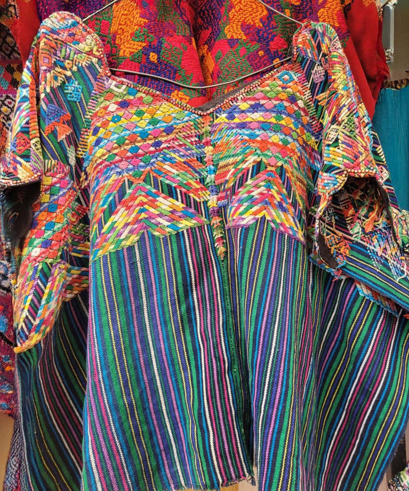 Blue and green Nahuala huipil with fish