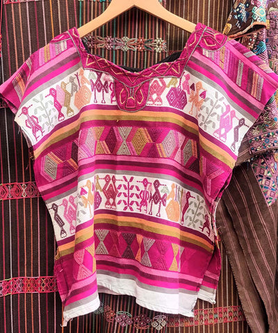 Playful pink and white Nebaj huipil