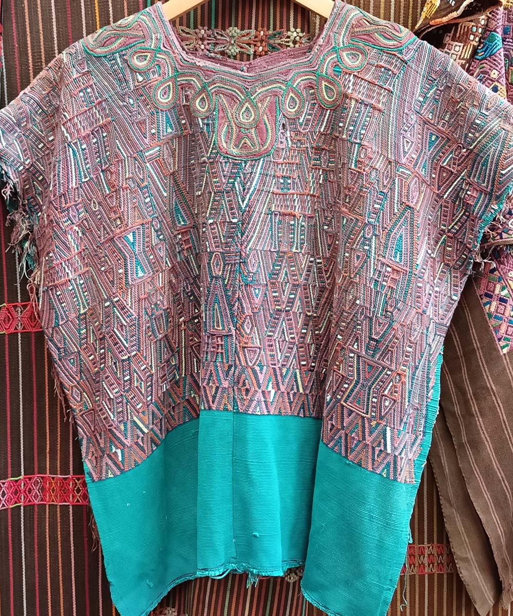 Warm pink and green Nebaj huipil
