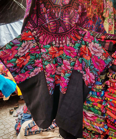 Pink and orange floral Chichi huipil