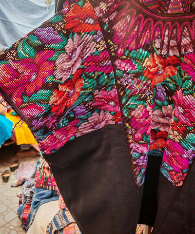 Pink and orange floral Chichi huipil