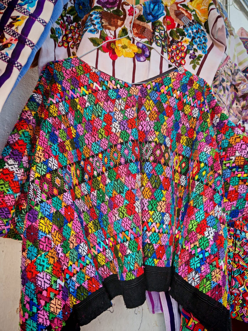 Colourful Coban huipil on black cotton