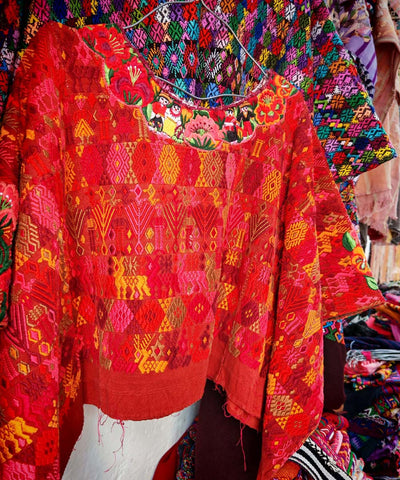 Bright orange Coban huipil