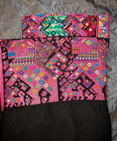 Pink and black Nahuala huipil