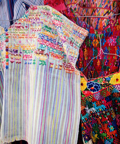 Faded blue striped Nahuala huipil