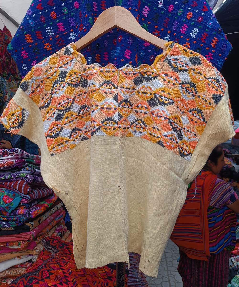 Lemon and orange geometric patterned huipil