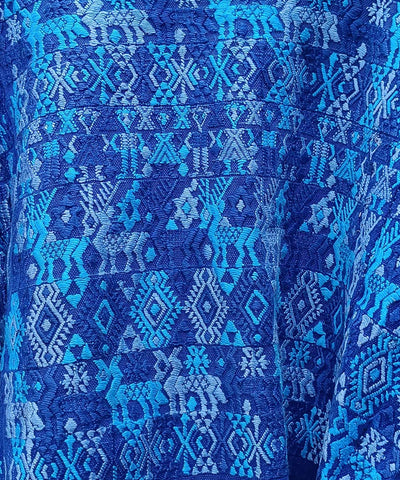 Bright blue Coban huipil