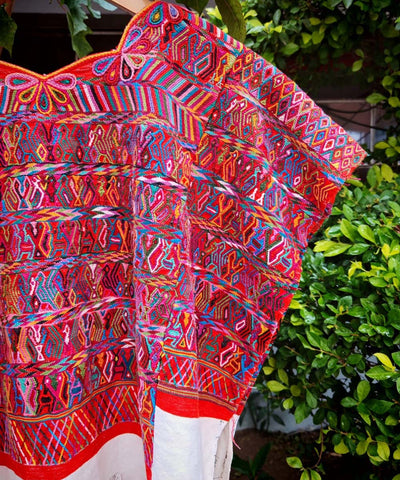 Red and white San Juan Cotzal huipil