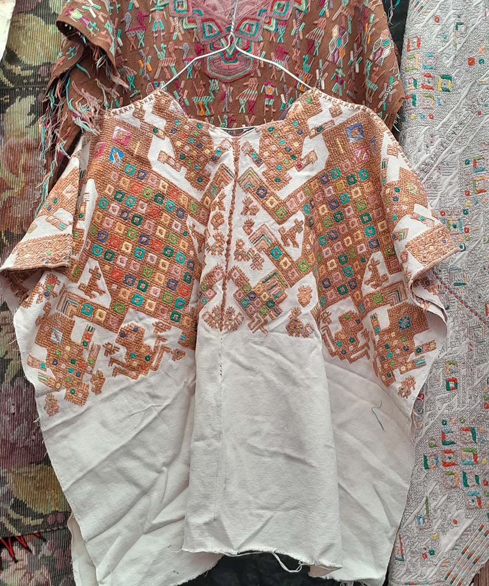 Brown and white Nahuala huipil