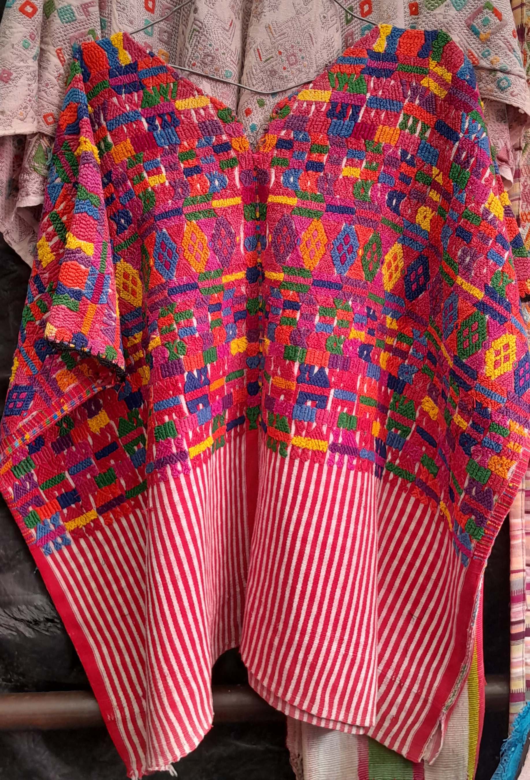 Red and purple huipil with stripes