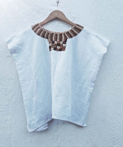 White huipil with brown ceremonial neckline