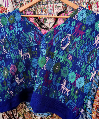 Blue and turquoise Coban huipil