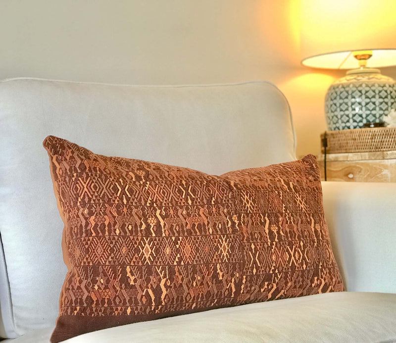 Embroidered Guatemalan huipil textile repurposed into a pillow