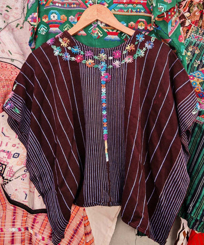 Burgundy huipil with floral neckline