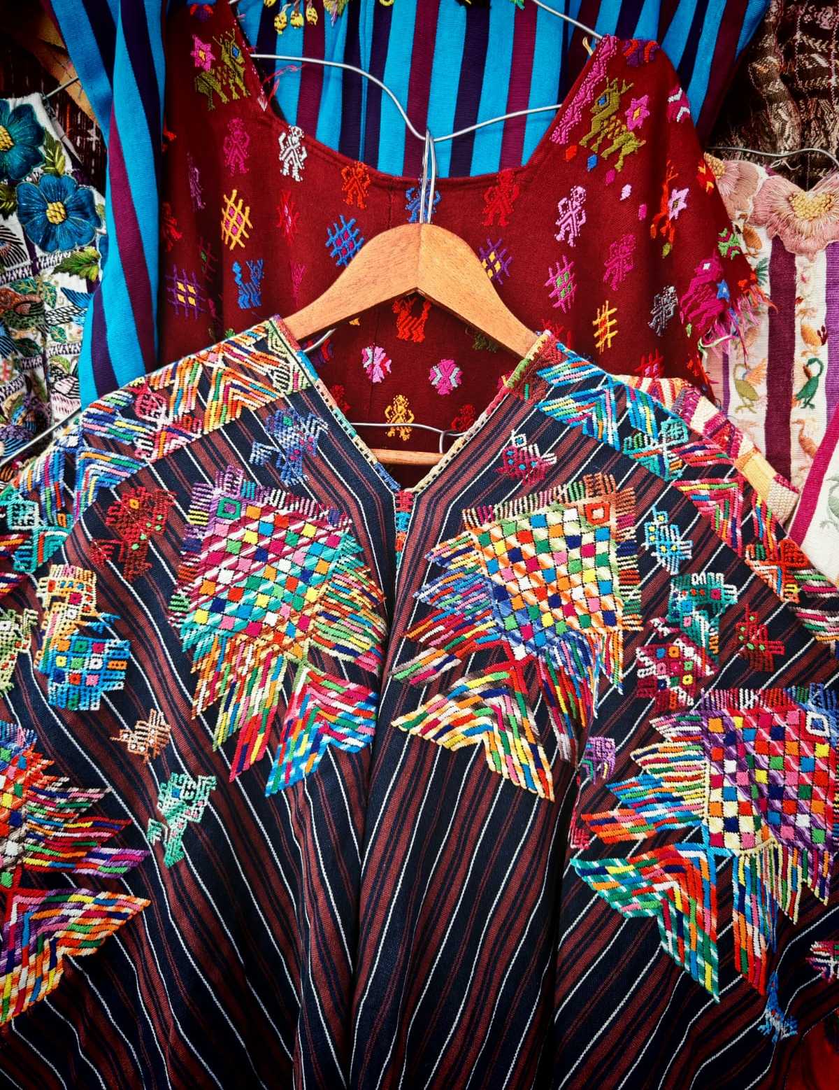 Striped black and burgundy Nahuala huipil #2-82